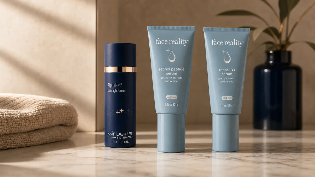 SkinBetter AlphaRet Overnight Cream and Face Reality retinoid serums on cream marble, Cleanse Face & Body Bar